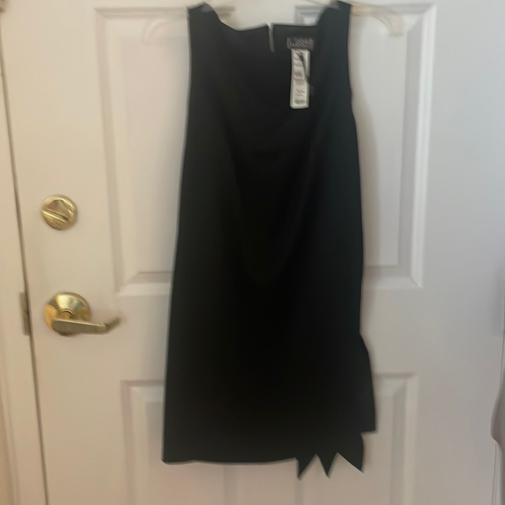 Beautiful little black dress. Wonderful material very stylish